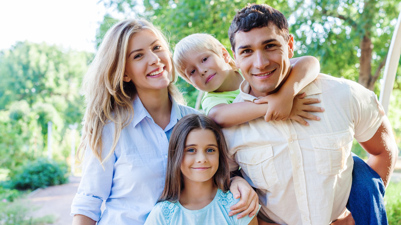 Smiling family two kids