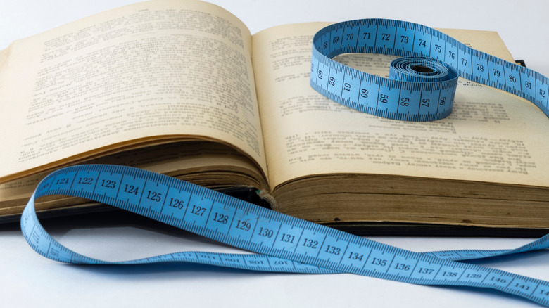 bible and body measurement tape
