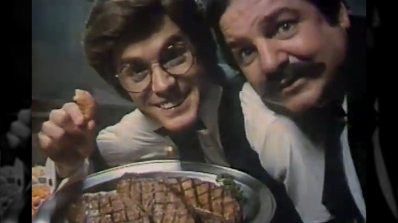 two actors with steak in commerical