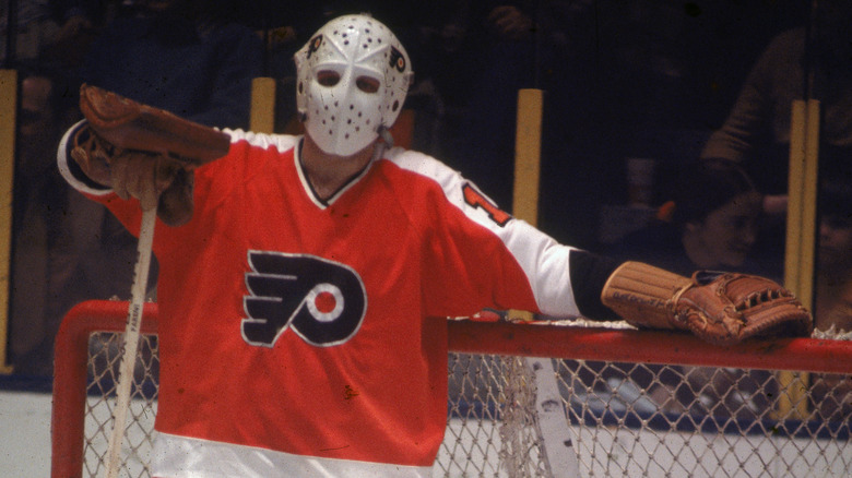 Bernie Parent leans on net